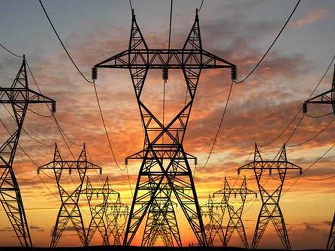 High-voltage transmission towers at sunset — utility visibility into distributed energy resources and coordinated grid flexibility